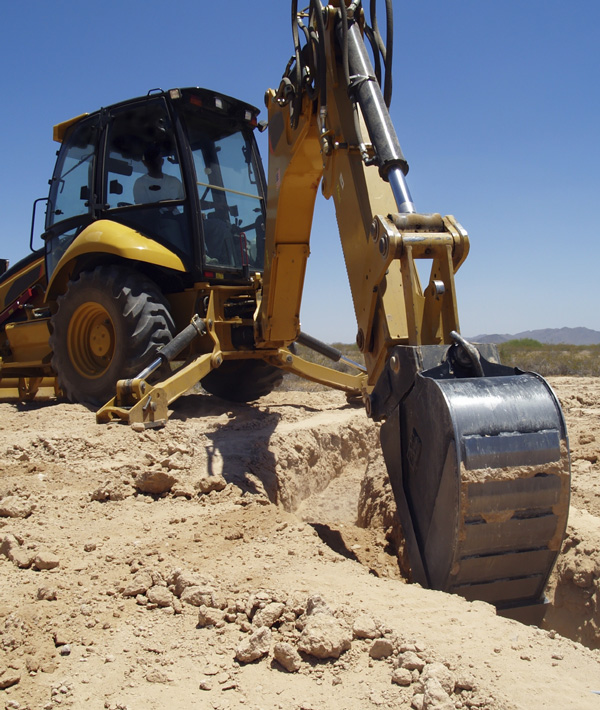 Contractor hand digging